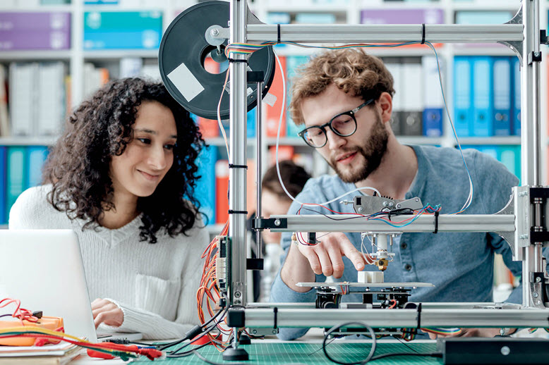 College Engineering Students in lab