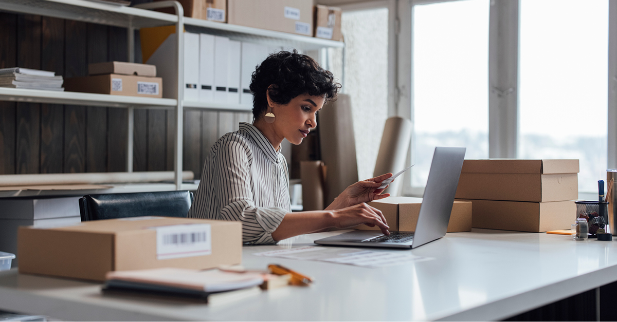 Woman business owner preparing shipments