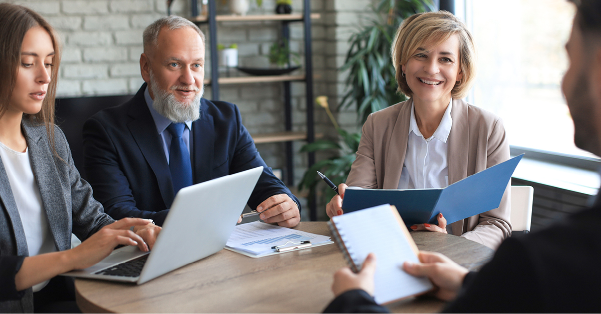 Advisors meeting with clients