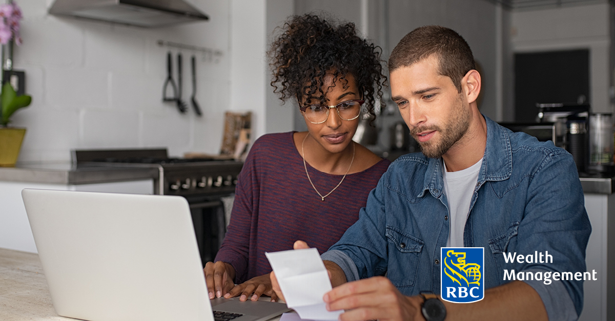 Young couple reviewing finances